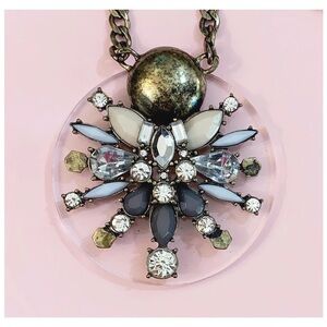BAUBLEBAR NOVA
Antique Gold Tone Crystals & Stones Clear Resin Disk
Necklace